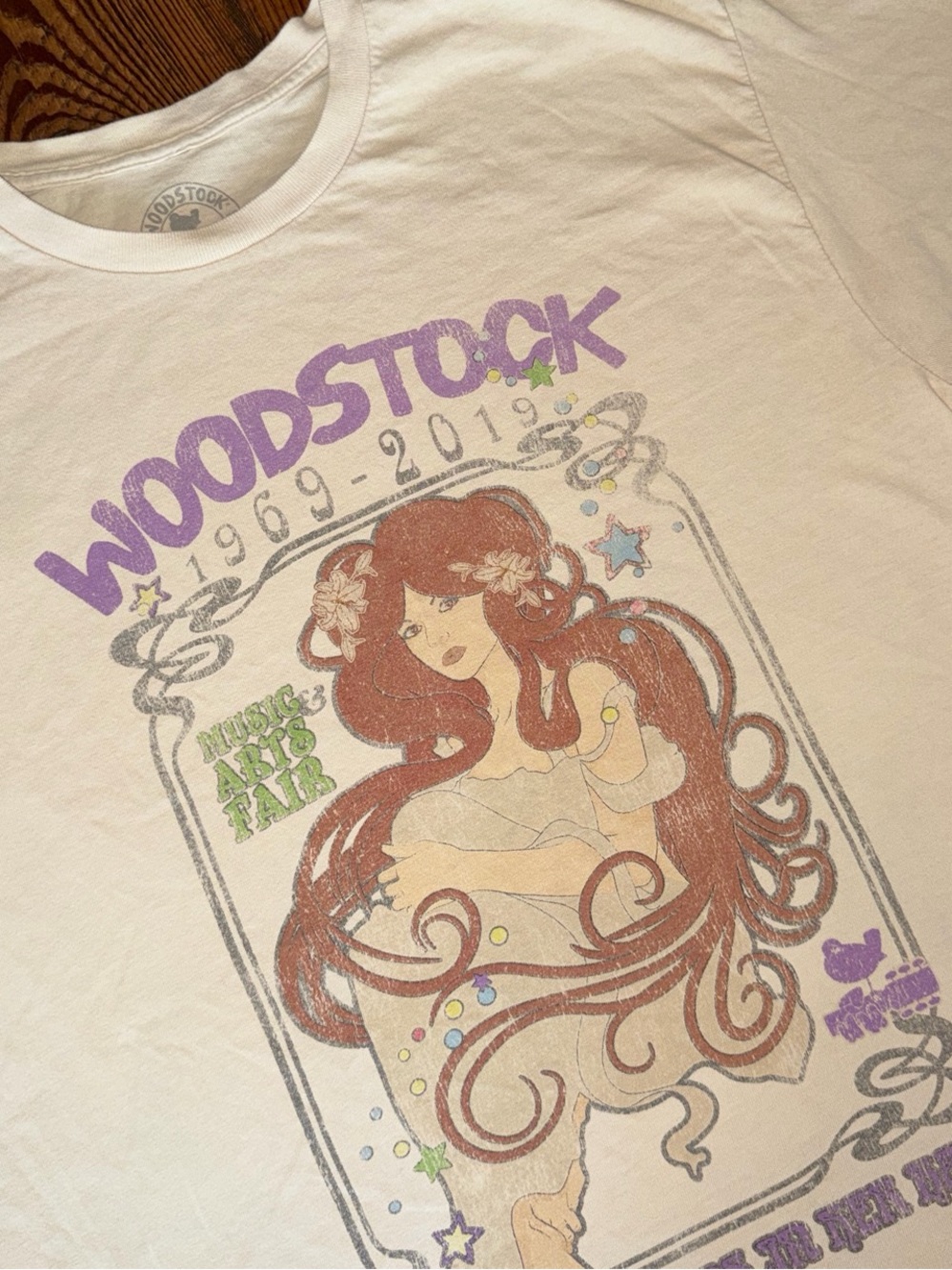 Woodstock Women’s 1969-2019 Graphic Tee - Cream with Purple & Brown Art-M/L